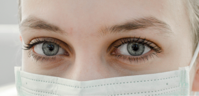 person with covid mask